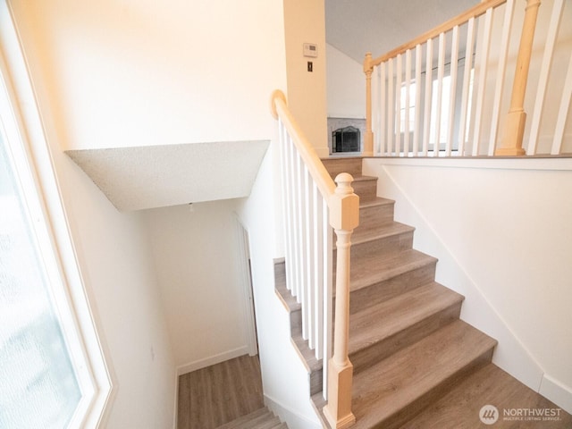 2840 SW 342nd St, Federal Way, WA 98023 - staircase featuring wood finished floors and lofted ceiling