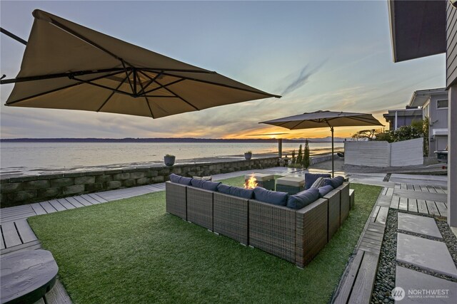 12065 30th Ave SW, Burien, WA 98146 - view of patio / terrace featuring an outdoor living space with a fire pit and a water view