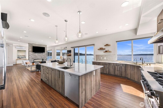 12065 30th Ave SW, Burien, WA 98146 - kitchen with a sink, stainless steel appliances, modern cabinets, an island with sink, and recessed lighting