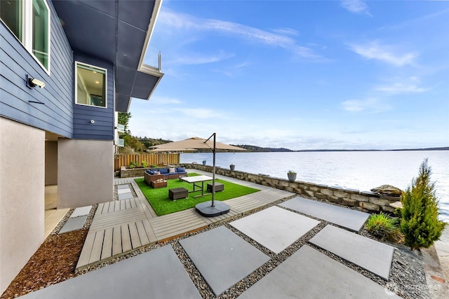 12065 30th Ave SW, Burien, WA 98146 - view of patio / terrace with an outdoor hangout area and a water view