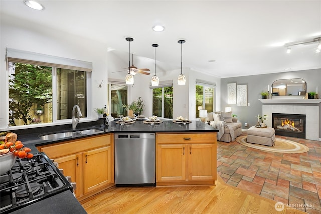 10820 NE 144th Ct, Kirkland, WA 98034 - kitchen featuring dishwasher, a sink, ceiling fan, dark countertops, and open floor plan