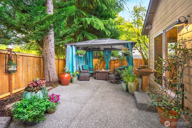 10820 NE 144th Ct, Kirkland, WA 98034 - fenced backyard with a gazebo and a patio area