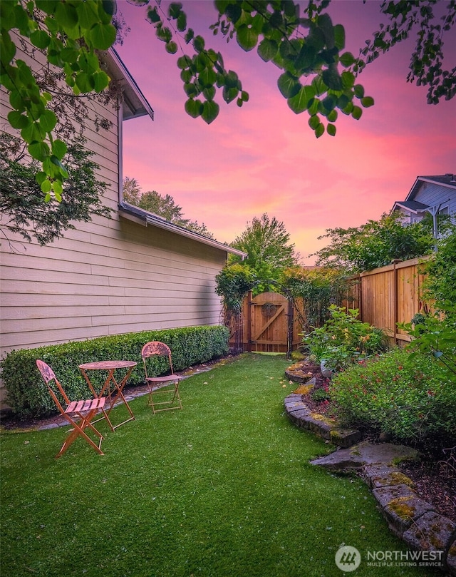 10820 NE 144th Ct, Kirkland, WA 98034 - yard at dusk with a gate