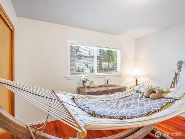 6810 Mount Tacoma Dr SW, Lakewood, WA 98499 - bedroom with wood finished floors and a closet