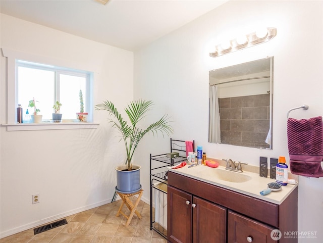 6810 Mount Tacoma Dr SW, Lakewood, WA 98499 - full bathroom featuring vanity, baseboards, and a shower with shower curtain