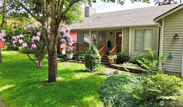21849 SE 266th Pl, Maple Valley, WA 98038 - view of front of property with a front yard and a chimney