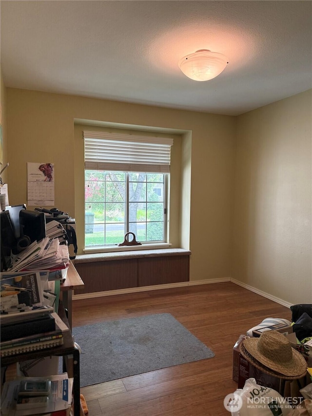 21849 SE 266th Pl, Maple Valley, WA 98038 - miscellaneous room with wood finished floors and baseboards