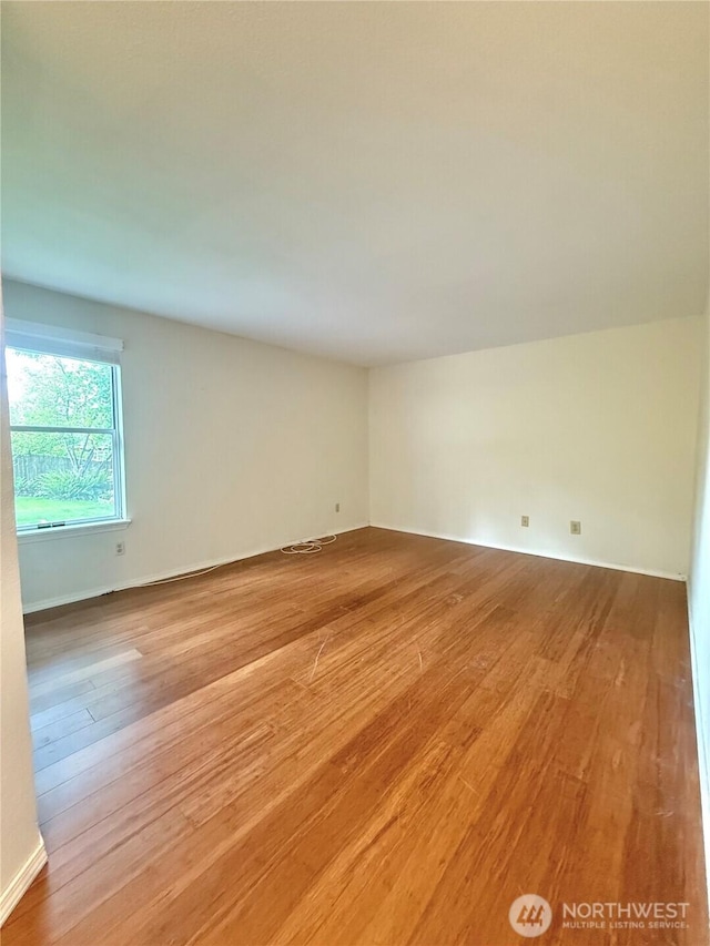 21849 SE 266th Pl, Maple Valley, WA 98038 - unfurnished room featuring light wood-style flooring