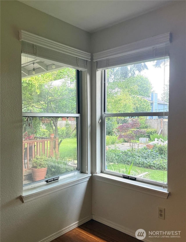 21849 SE 266th Pl, Maple Valley, WA 98038 - detailed view of baseboards and wood finished floors