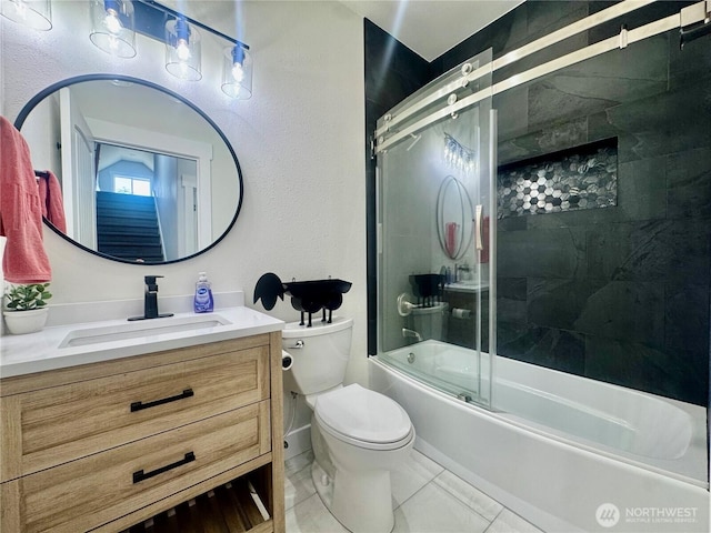 31 Apple Meadow Dr, Tonasket, WA 98855 - bathroom with toilet, vanity, enclosed tub / shower combo, and tile patterned flooring