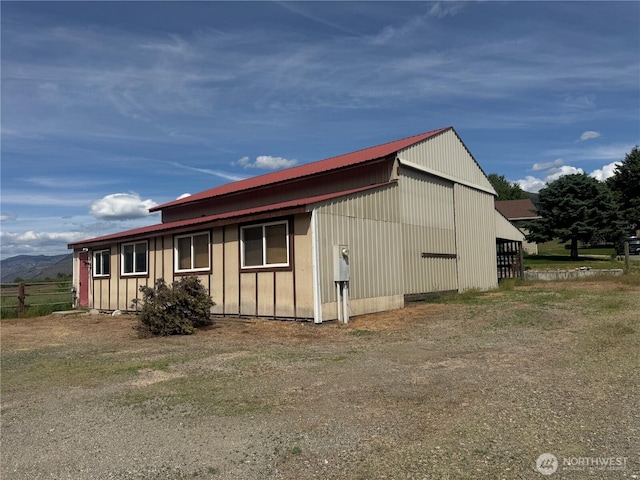 31 Apple Meadow Dr, Tonasket, WA 98855 - view of side of property with metal roof and an outbuilding