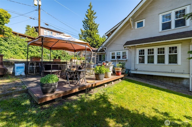 214 N 4th St, Mount Vernon, WA 98273 - view of green lawn with a gazebo and a wooden deck