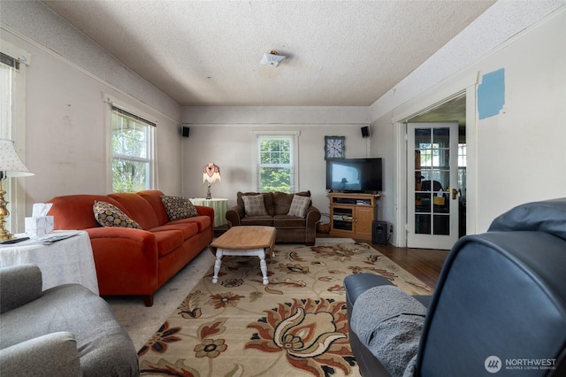 214 N 4th St, Mount Vernon, WA 98273 - living area with a textured ceiling and wood finished floors