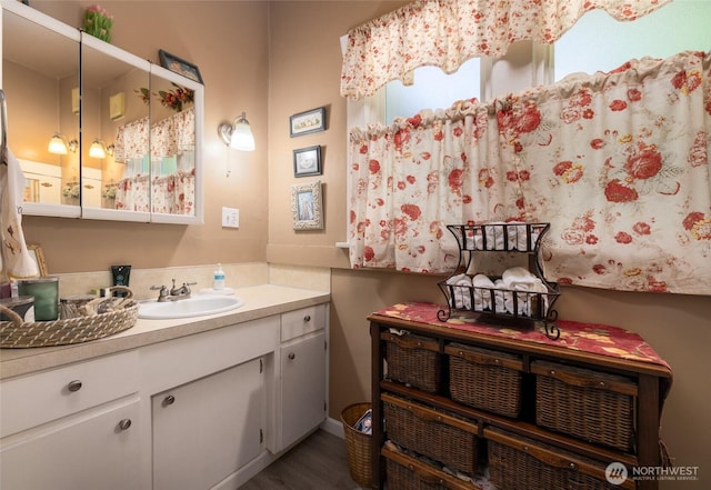 214 N 4th St, Mount Vernon, WA 98273 - bathroom featuring vanity and wood finished floors