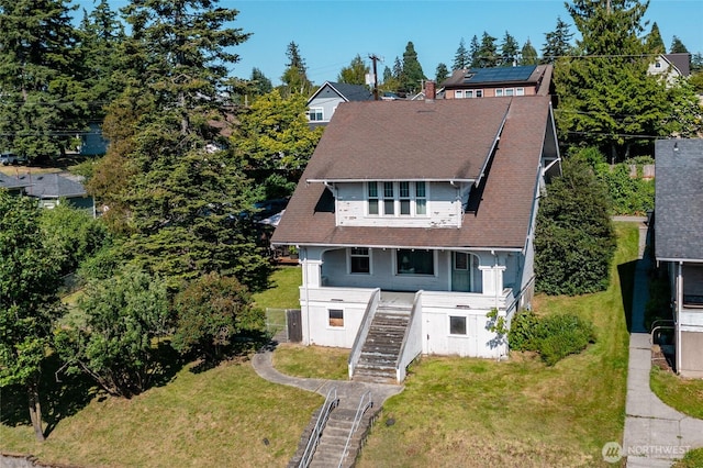 214 N 4th St, Mount Vernon, WA 98273 - view of front of property with stairway, a front lawn, a porch, and a shingled roof