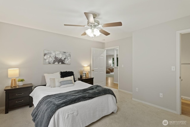 820 173rd Ave NE, Bellevue, WA 98008 - bedroom featuring light carpet, baseboards, and a ceiling fan