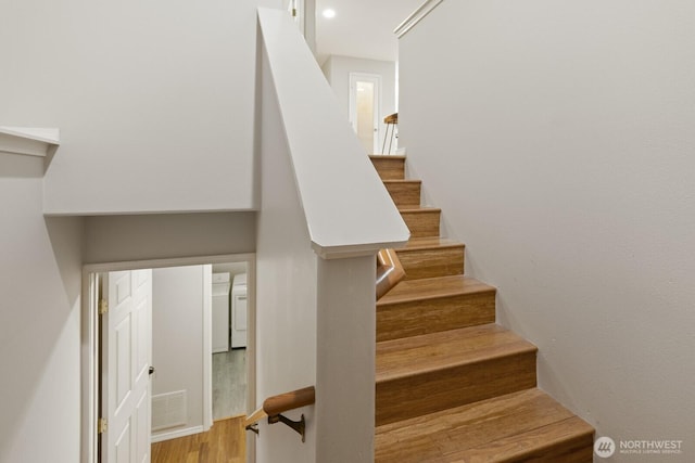 820 173rd Ave NE, Bellevue, WA 98008 - staircase featuring wood finished floors