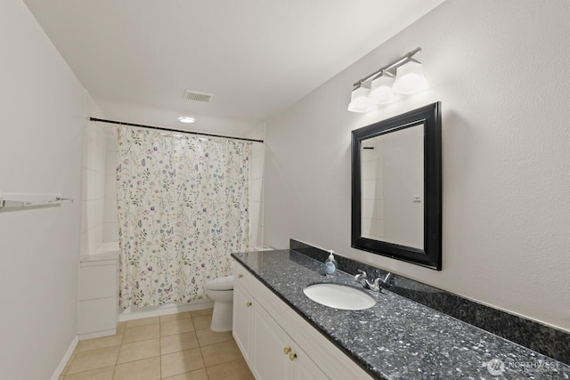 820 173rd Ave NE, Bellevue, WA 98008 - bathroom with toilet, tile patterned flooring, vanity, and shower / tub combo with curtain