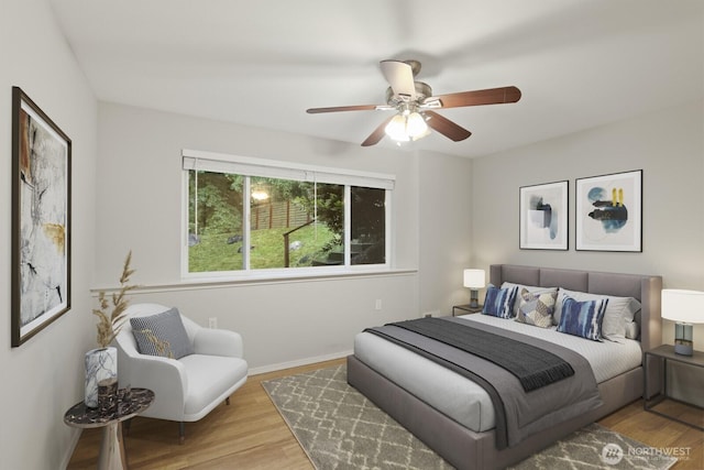 820 173rd Ave NE, Bellevue, WA 98008 - bedroom with wood finished floors, baseboards, and a ceiling fan