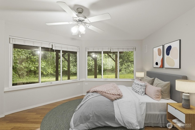 820 173rd Ave NE, Bellevue, WA 98008 - bedroom featuring wood finished floors, baseboards, and a ceiling fan