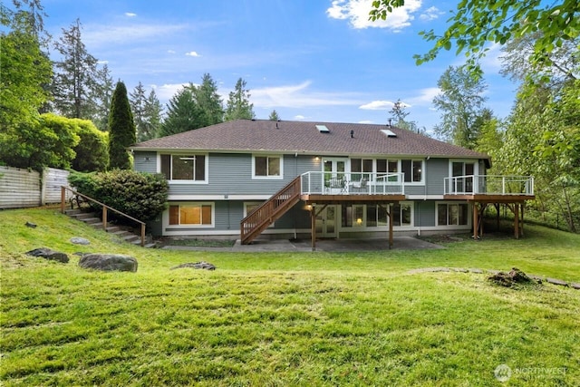 820 173rd Ave NE, Bellevue, WA 98008 - back of house with stairs, a deck, and roof with shingles