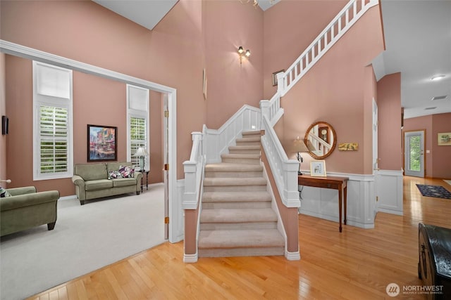 5426 Quail Run, Blaine, WA 98230 - stairway with wood finished floors, healthy amount of natural light, baseboards, and a towering ceiling