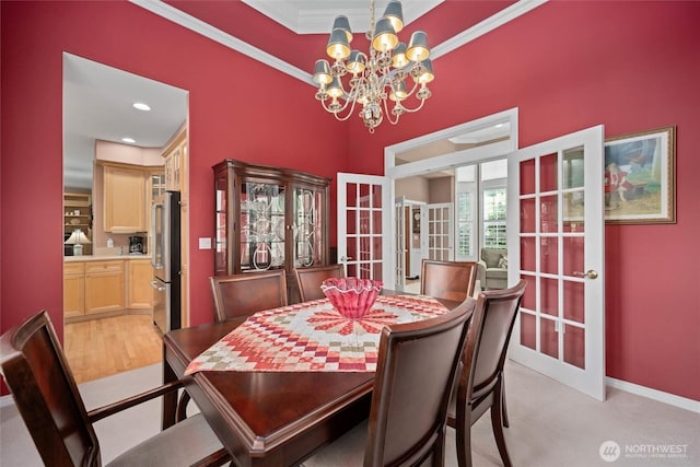 5426 Quail Run, Blaine, WA 98230 - dining area featuring french doors, a chandelier, crown molding, light colored carpet, and recessed lighting