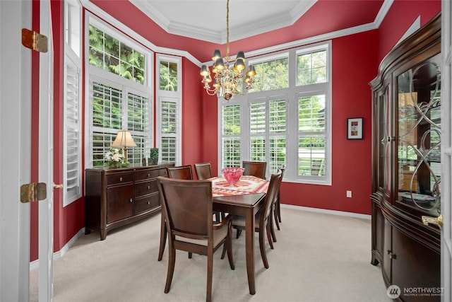 5426 Quail Run, Blaine, WA 98230 - dining room featuring light colored carpet, a chandelier, baseboards, and ornamental molding