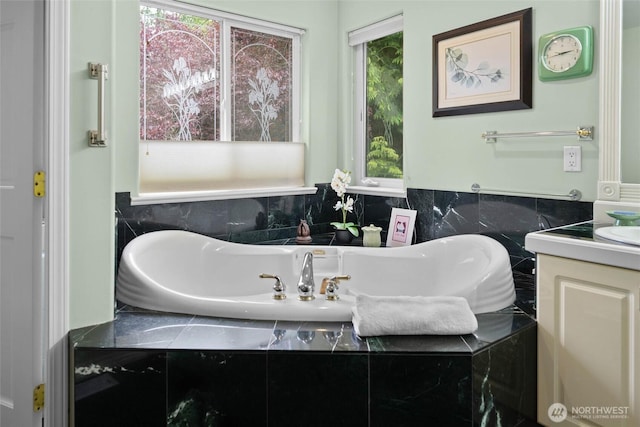 5426 Quail Run, Blaine, WA 98230 - bathroom featuring a tub and vanity