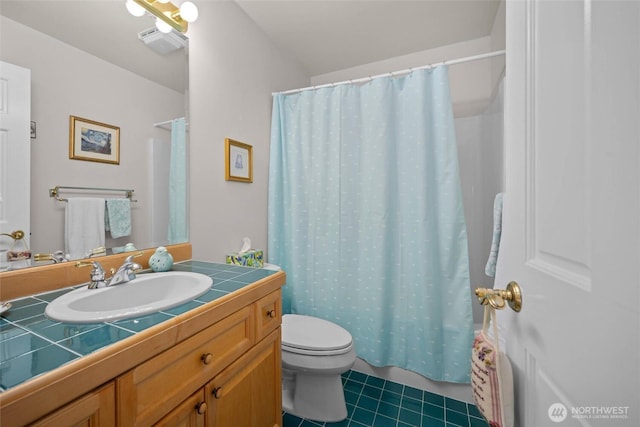 5426 Quail Run, Blaine, WA 98230 - bathroom with tile patterned flooring, toilet, and vanity