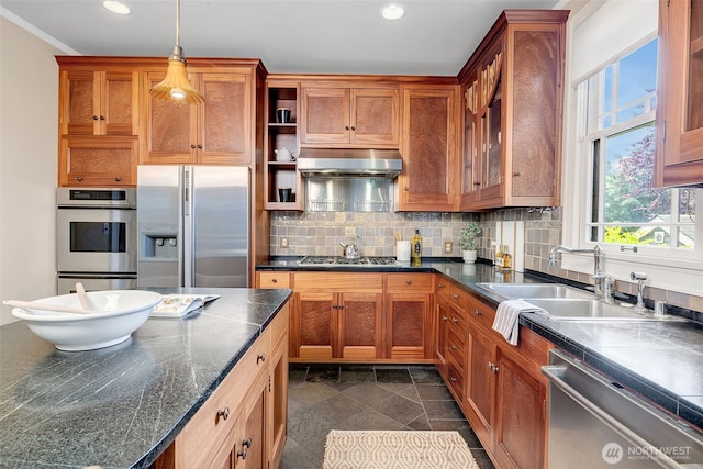 903 W Newell St, Seattle, WA 98119 - kitchen featuring stainless steel appliances, under cabinet range hood, a sink, backsplash, and recessed lighting