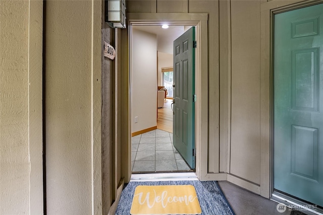 5430 Snow Goose Ln Unit 202, Blaine, WA 98230 - corridor with light tile patterned floors and a textured wall