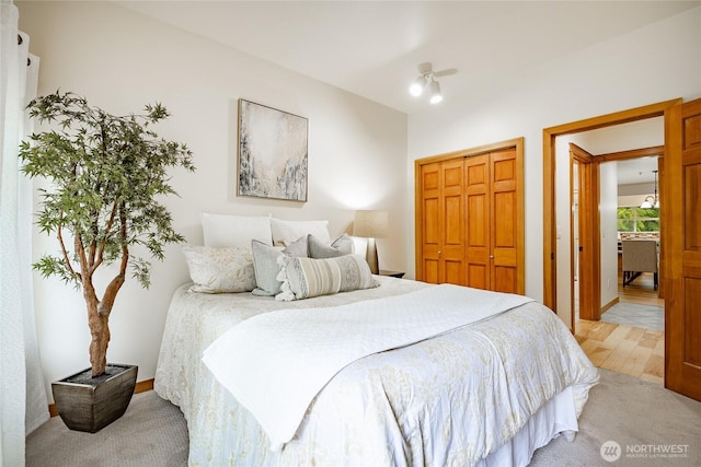 5430 Snow Goose Ln Unit 202, Blaine, WA 98230 - bedroom featuring light colored carpet, a closet, and baseboards