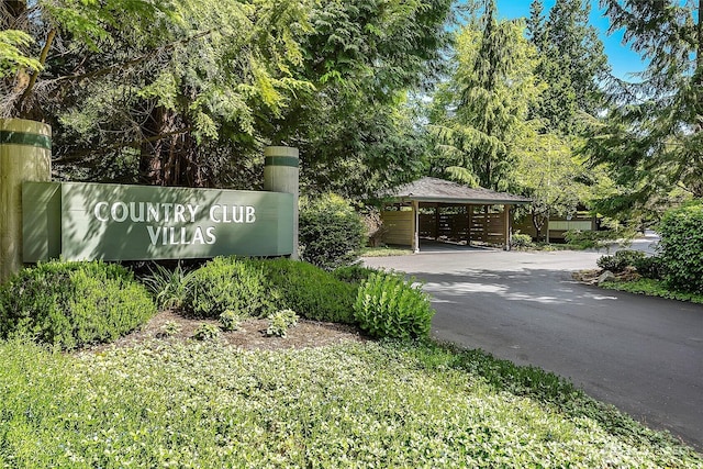 5430 Snow Goose Ln Unit 202, Blaine, WA 98230 - community sign with a detached carport and asphalt driveway