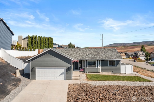 1348 Wheatridge Dr, East Wenatchee, WA 98802 - ranch-style home featuring concrete driveway and a garage