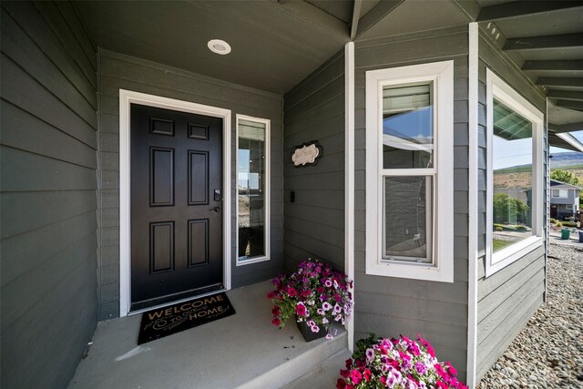 1348 Wheatridge Dr, East Wenatchee, WA 98802 - view of exterior entry with a porch