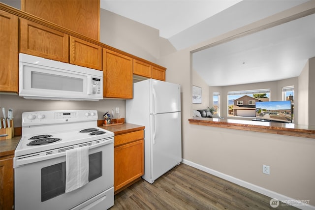 1348 Wheatridge Dr, East Wenatchee, WA 98802 - kitchen with white appliances, dark wood-style flooring, brown cabinetry, and baseboards