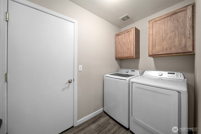 1348 Wheatridge Dr, East Wenatchee, WA 98802 - washroom with washer and dryer, cabinet space, dark wood finished floors, and baseboards