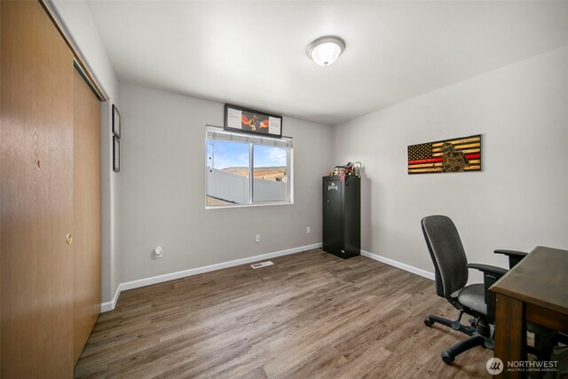 1348 Wheatridge Dr, East Wenatchee, WA 98802 - home office with wood finished floors and baseboards
