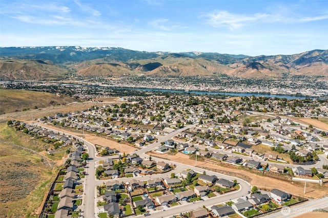 1348 Wheatridge Dr, East Wenatchee, WA 98802 - aerial overview of property's location with nearby suburban area and a water and mountain view
