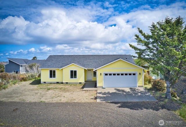 1376 Sand Pebble Ave SW, Ocean Shores, WA 98569 - view of front facade featuring an attached garage, concrete driveway, and a shingled roof
