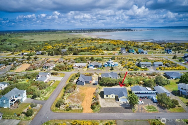 1376 Sand Pebble Ave SW, Ocean Shores, WA 98569 - aerial perspective of suburban area with a large body of water