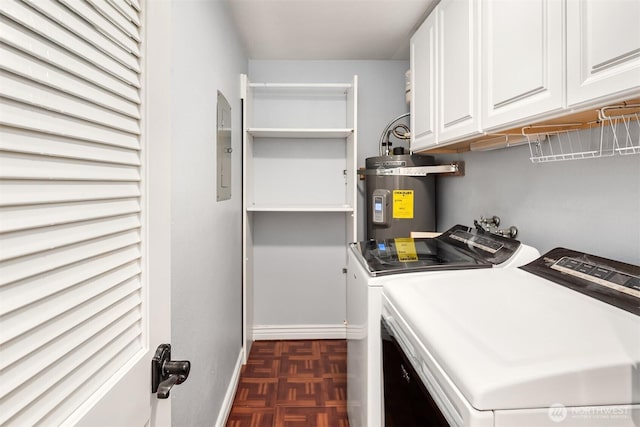 16929 Inglewood Rd NE Unit C206, Kenmore, WA 98028 - laundry area featuring electric water heater, cabinet space, washer and clothes dryer, baseboards, and electric panel