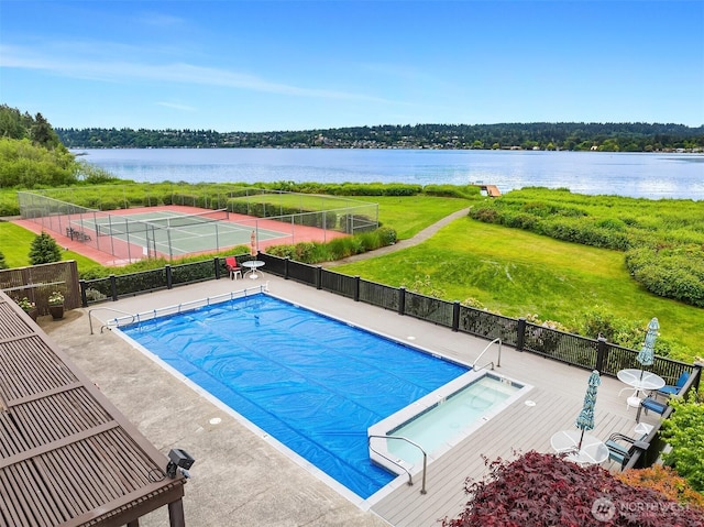 16929 Inglewood Rd NE Unit C206, Kenmore, WA 98028 - view of swimming pool featuring a tennis court and a water view