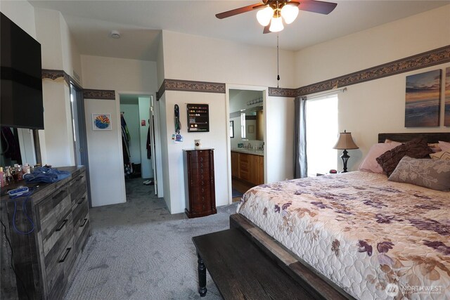 1427 100th St SW Unit 57, Everett, WA 98204 - carpeted bedroom featuring ensuite bath and ceiling fan