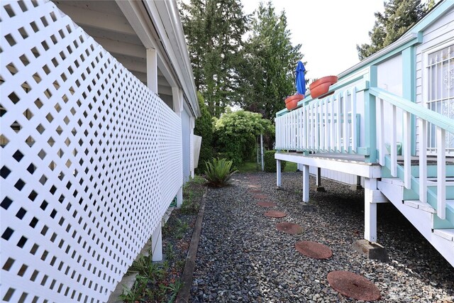 1427 100th St SW Unit 57, Everett, WA 98204 - view of yard featuring a deck