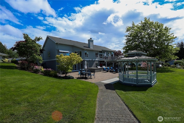 1427 100th St SW Unit 57, Everett, WA 98204 - rear view of house featuring a gazebo, a patio, and a yard