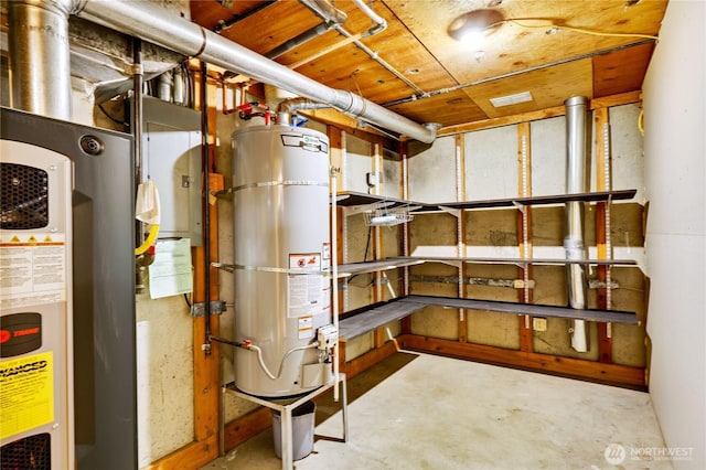 utility room featuring gas water heater