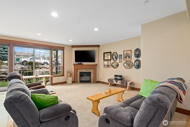 1051 N Baker Unit B104, East Wenatchee, WA 98802 - living room featuring baseboards, a fireplace, recessed lighting, and light carpet
