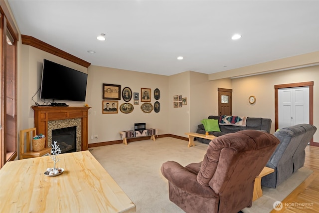 1051 N Baker Unit B104, East Wenatchee, WA 98802 - living area featuring baseboards, a glass covered fireplace, and recessed lighting